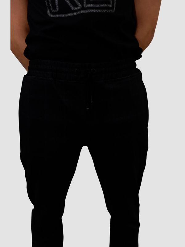 Jogger a cuadros con logo