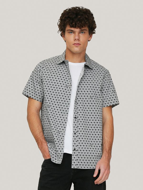 Camisa con estampado abstracto y firma