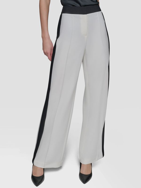 Pantalón con pliegues en contraste