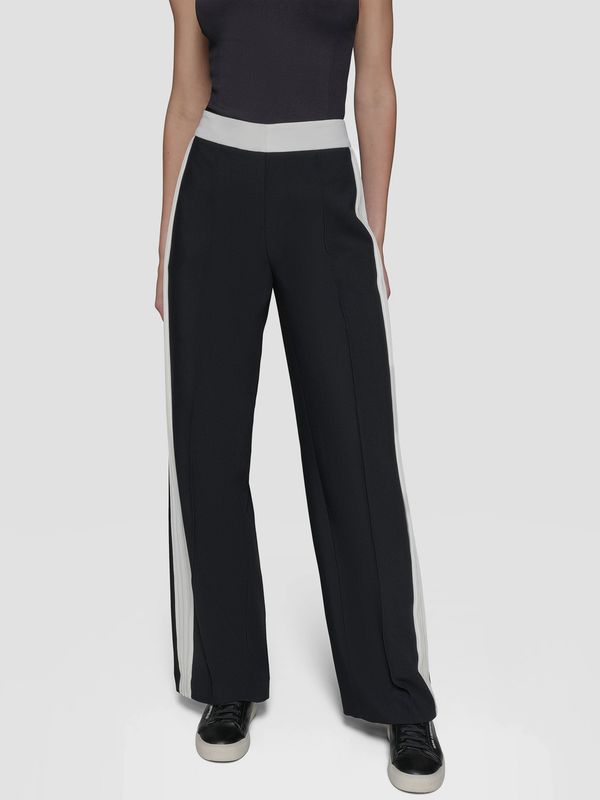 Pantalón con pliegues en contraste