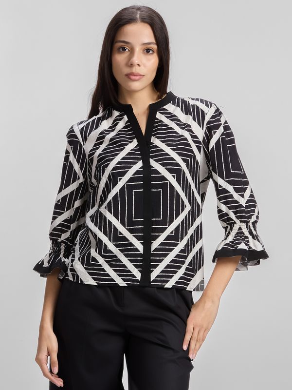 Blusa con estampado geométrico